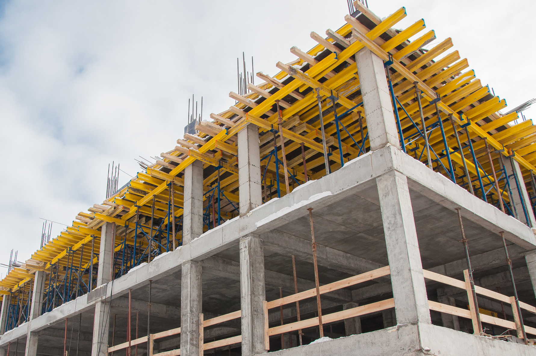 Concrete frame of the building under construction. Concrete construction